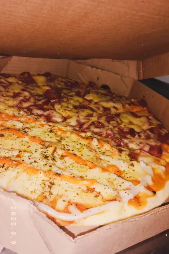 Pizza família 